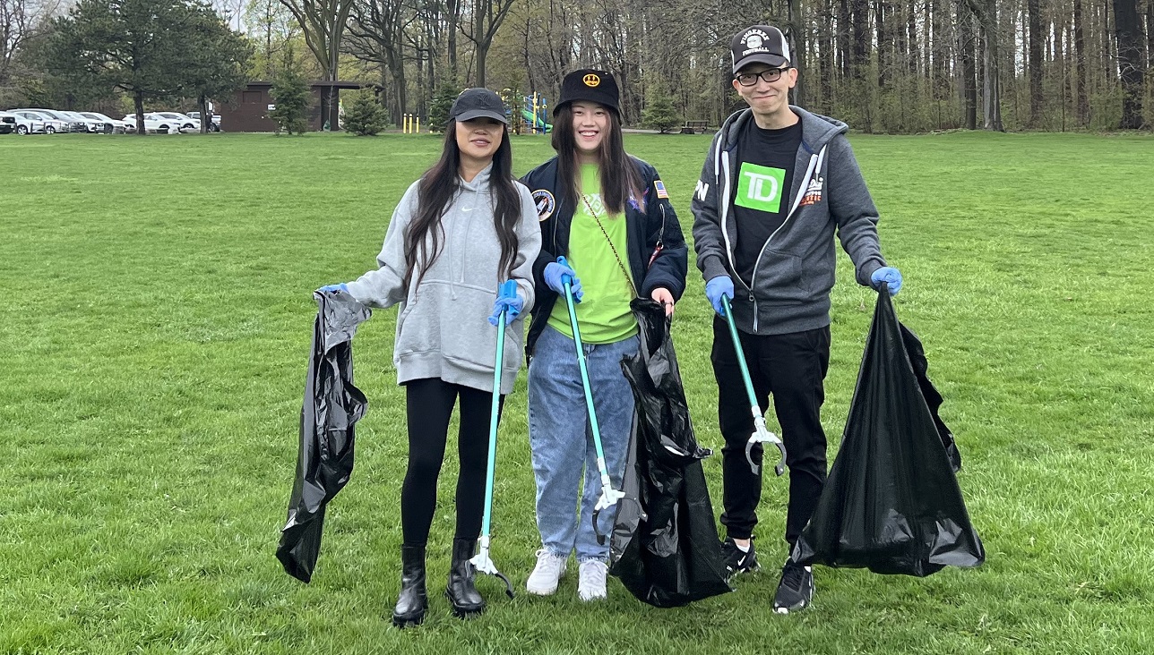 high school students take part in a volunteer litter cleanup event in The Meadoway