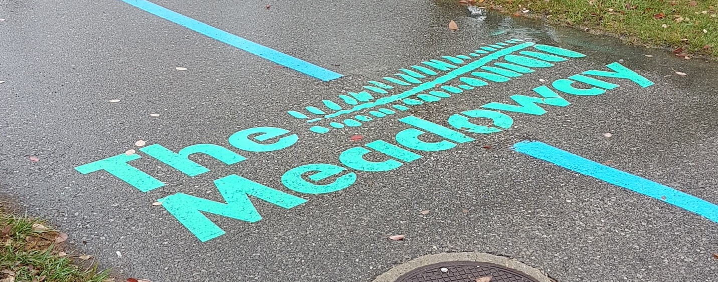 freshly painted logo on The Meadoway multi-use trail