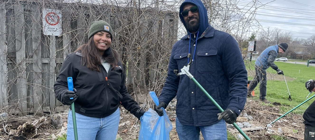 corporate team members take part in a Meadoway cleanup event