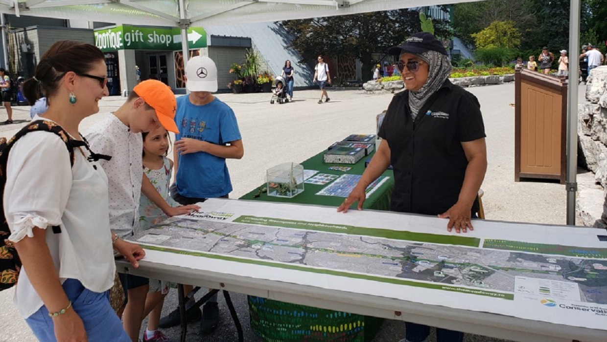 community members visit The Meadoway booth at public engagement event