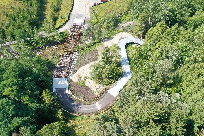 aerial view of newly installed bridge over East Highland Creek