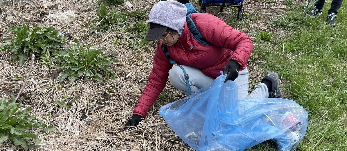 community member takes part in a cleanup event in The Meadoway